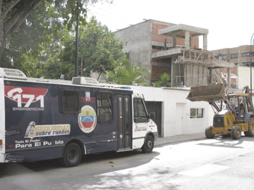 A “security on wheels” bus is permanently stationed outside the new building for Tiferet Israel synagogue in Caracas, Venezuela. photo/jta/jasmina kelemen